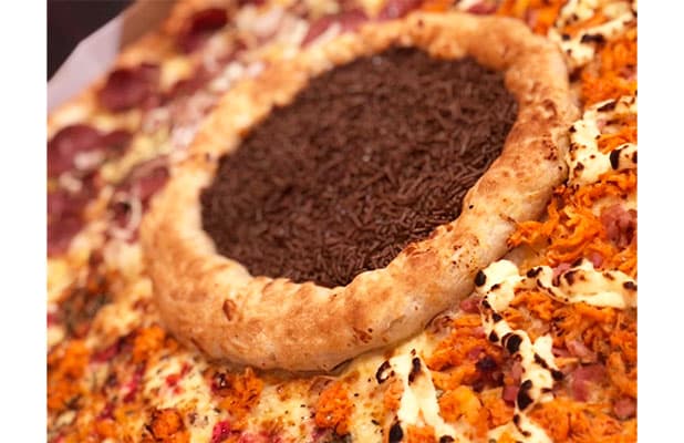 Gigantesca Pizza com 20 Fatias (60 cm) nos Sabores Clássicos, Sensacionais ou Exclusivas, a partir de R$69,90. Pizza Gigantesca e Saborosíssima!